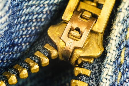 Blue jeans, gold zipper fly, macro imageの写真素材