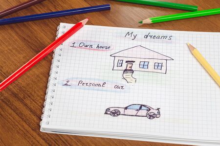 My dream, own house and personal car written text and drawing on the notepad, color pencils on the table. concept of visualization futureの写真素材
