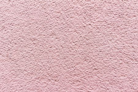 Texture of exterior pink cement wall, backgroundの写真素材