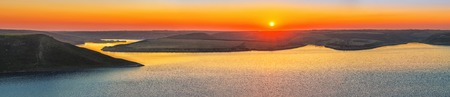 Panorama view of magnificent sunset scenery on the Dniester river, national park Podillya Tovtry, Ukraineの写真素材