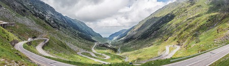 Panoramic view of the most famous and dangerous road in Europe is a Transfagarasan road in Carpathian mountains, Romania.の写真素材