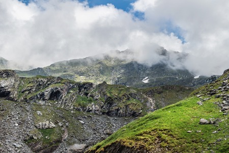 Mountain landscape of the high rocky Fagaras mountains in Carpathians, near the Transfagarasan road, Romania.の写真素材