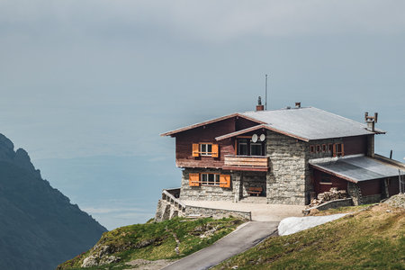 FAGARAS MOUNTAINS, ROMANIA - JUNE 20, 2017:House over the precipice in Carpathian mountains near the Balea lake.のeditorial素材