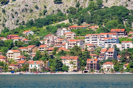 View on the european city with orange tiling roofs at boka-kotor bay in Adriatic sea , Montenegro.