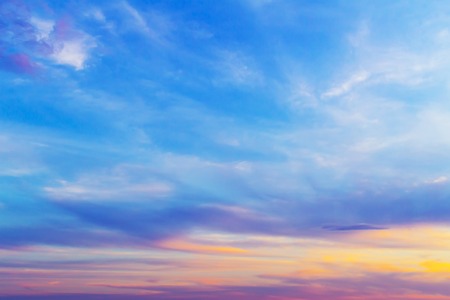 Colorful dramatic sky with clouds at sunset.の写真素材