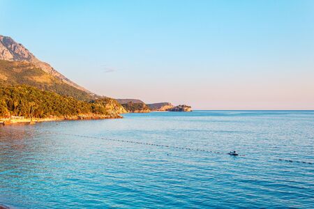 Adriatic sea coast in Budva Riviera at sunset warm sunlight, Montenegro.の写真素材