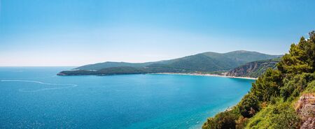 Panoramic view from above to the Adriatic sea coastline and Jaz beach near a Budva city, Montenegro.の写真素材