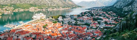 Cityscape of old city Kotor, bay in Adriatic sea surrounded by mountains, Montenegro. Panoramic view...