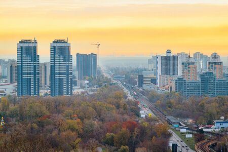 Kyiv city at sunrise in dawn, colorful autumn cityscape in the morning, Ukraine.の写真素材