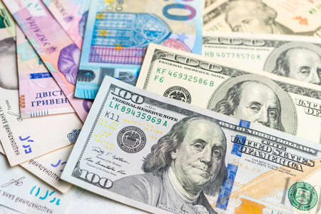 Different currency, dollar, euro and hryvnia banknotes, money.