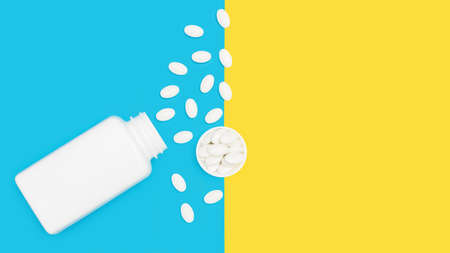 White pills for treatment on blue and yellow background, pharmacy and medicine concept, top view.