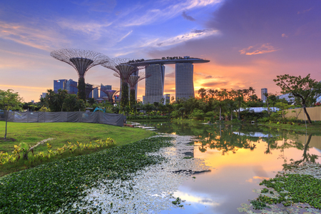 sunset of Singapore Marina Bay, including its latest Marina Bay Sands Integrated Resort.のeditorial素材