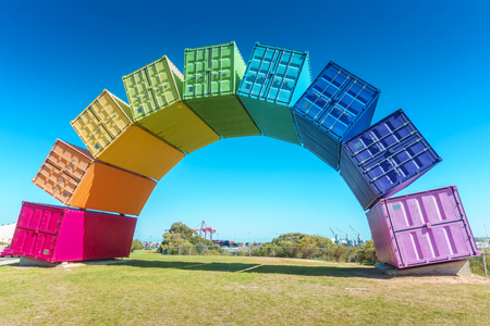 A rainbow of sea containers against a beautiful blue sky in Fremantle, Western Australia.の写真素材