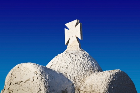 The cross of the small white ortodox christian chapel in Sarti, Greeceの写真素材