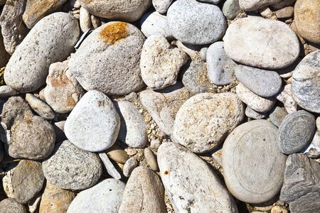 Decorative stone, gravel, pebbles as a background, texture の写真素材