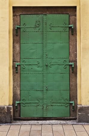 Old turquoise vintage doorの写真素材