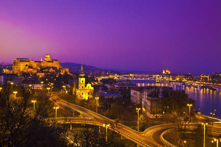 Panorama view at night from the Gellert hill to the Buda castle, the Parliament and the Chain Bridge in Budapest, Hungaryの写真素材