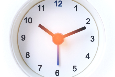 Close up image of  white modern clock at 10.10 a.m