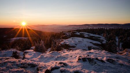 Sunset in the winter rocksの写真素材