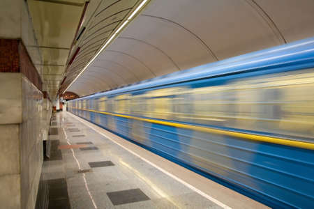 Fast train with motion blur in a subwayの写真素材