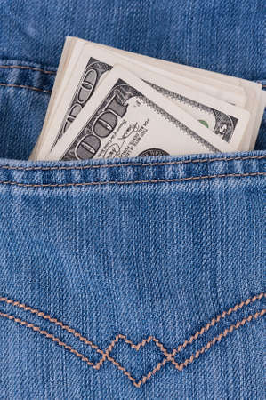 Dollars in a pocket of jeans