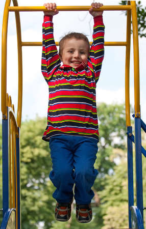 happy child playing at a playground.