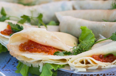 Pancake with red caviar and 