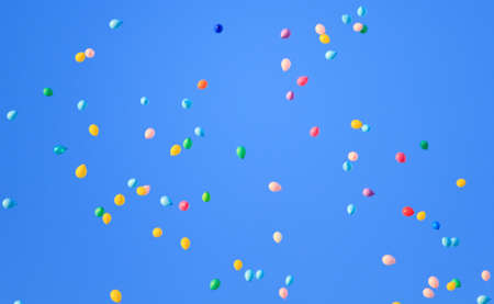 Flying balloons in the blue skyの写真素材
