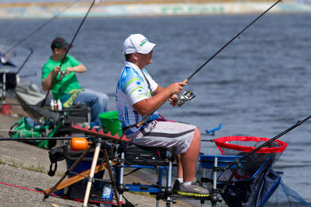 VYSHGOROD, UKRAINE - JUNE 7,2014 : Fshing competition "Fishing Feeder Cup of Ukraine"  on the municipal embankment of the Kyiv sea in Vyshgorod , Ukraine . のeditorial素材