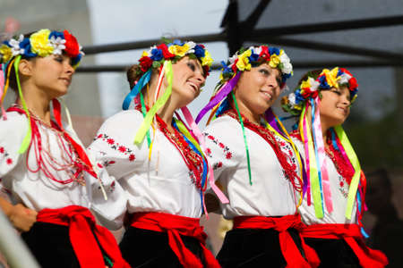 KIEV, UKRAINE - AUGUST 24, 2011: Beautiful girls in the Ukrainian national clothes dance on the Independence of Ukraine day in Kiev, Ukraine .のeditorial素材