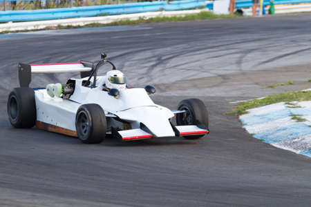 Formula three  race car on a speed trackのeditorial素材