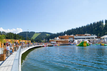 BUKOVEL, UKRAINE -  AUGUST 20, 2016: The summer lake panorama of Bukovel resort  Carpathian mountains in Bukovel, Ukraine.のeditorial素材