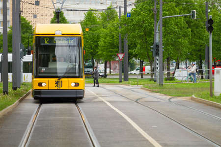 Dresden, Germany - April 06, 2010:Yellow tram rides to the city of Dresden, Germanyのeditorial素材