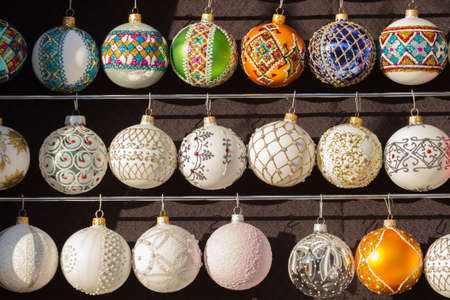 Christmas balls in a street marketの写真素材