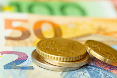 Money euro coins and banknotes backgroundの写真素材