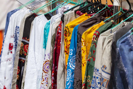 Kyiv, Ukraine - May26, 2019:Ukrainian folk dresses embroidered with threads are sold at a street...
