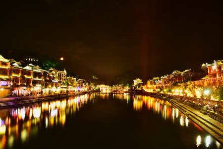 night scene of Fenghuang (Phoenix) ancient town Hunan Chinaのeditorial素材