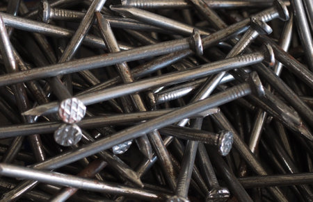 Close up of a pile of metal nails for construction and repair.の写真素材