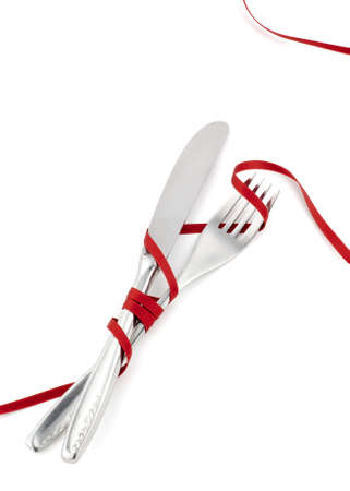 Metal covered with red ribbon woundの写真素材