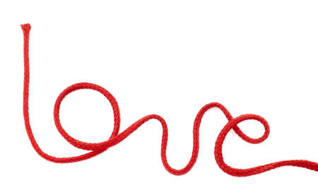 Palabra amor escrita con cuerda de color rojoの写真素材