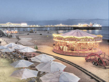 A view of Brighton Pier and beach at nightのeditorial素材