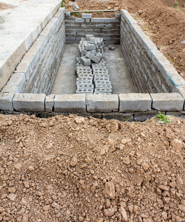 The process of building a home pool for storing waterの写真素材