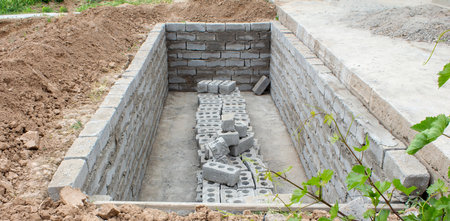 The process of building a home pool for storing waterの写真素材