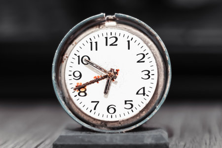 Old retro clock with rust, old table clock