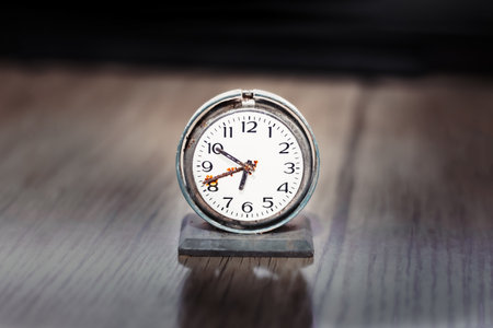 Old retro clock with rust, old table clock