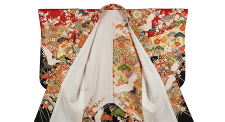 A stunning, ornate Japanese kimono featuring vibrant floral motifs and traditional designs, presented isolated on a clean white background.の素材
