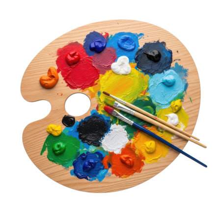 A classic wooden artist's palette brimming with colorful oil paints and art brushes. This image captures the essence of creativity, ready for inspiration and painting.の素材
