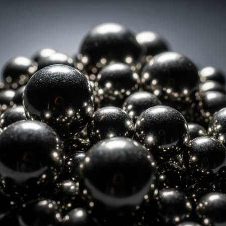 An extreme close-up view of a dense cluster of metallic orbs. The spheres are highly reflective, showcasing intricate highlights and shadows, creating a mesmerizing textural display.の素材
