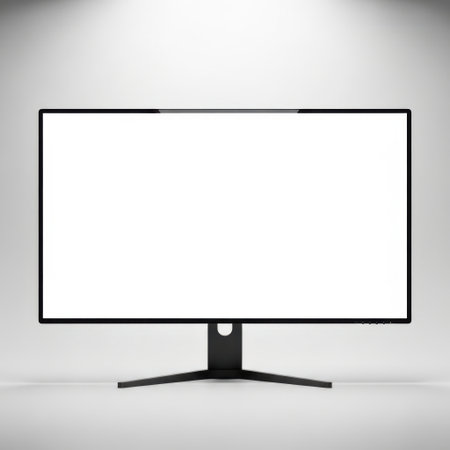 A sleek computer monitor with a blank white screen is presented isolated on a clean white background.の素材