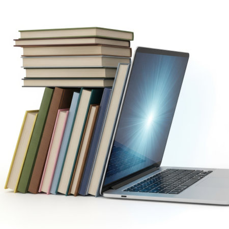 A collection of educational books is propped up by a sleek laptop, presented on a clean white background.の素材
